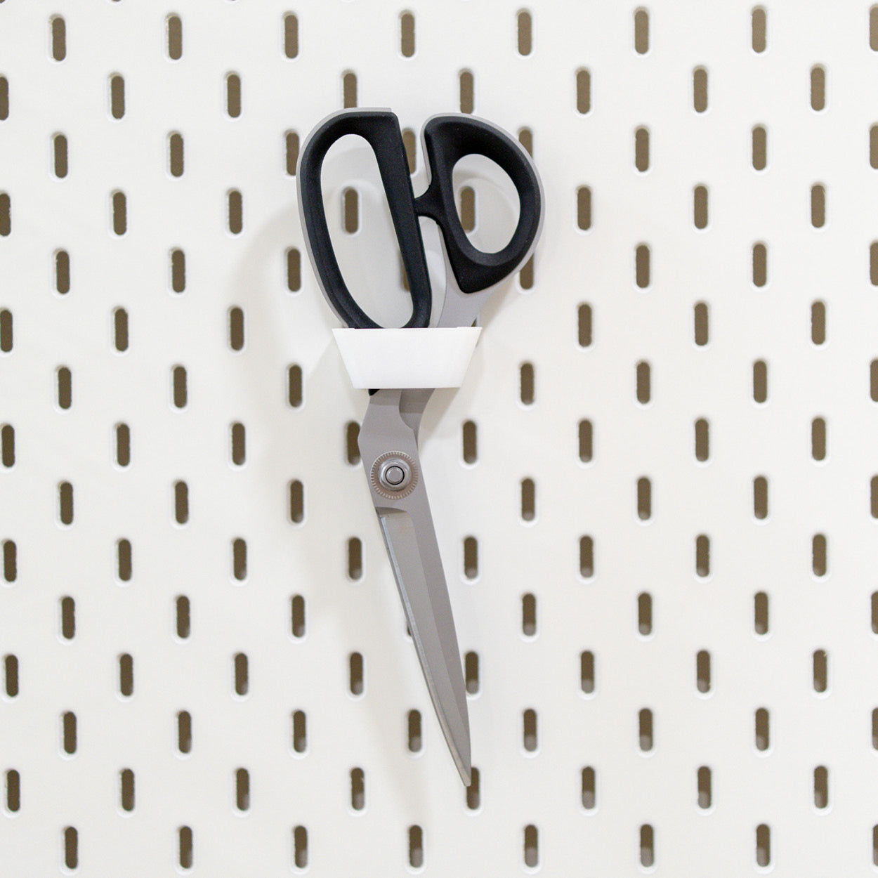Scherenhalter für Lochplatte